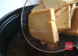 Illustration of how to make braised tofu in broth 6