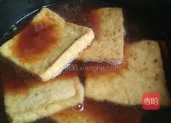 Illustration of how to make braised tofu in broth 7