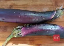 Illustration of how to stir-fry diced eggplant with walnut puree 2