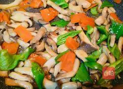 Illustration of how to stir-fry mushrooms with green peppers 6