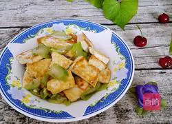 Illustration of how to make stir-fried tofu with luffa 9
