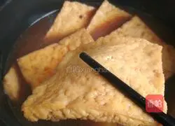 Illustration of how to make braised tofu in broth 8