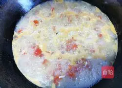 Illustration of how to make tomato and enoki mushroom tofu stew 7