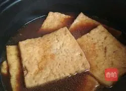 Illustration of how to make braised tofu in broth 9