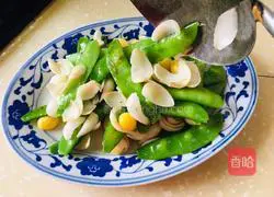 Illustration of how to make fried snow peas with lilies and ginkgo almonds 10