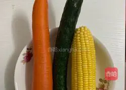 Illustration of how to make stir-fried carrots and cucumbers with sweet corn 1