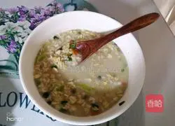 Illustration of how to make dormitory vegetable oatmeal porridge 3