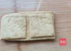 Illustration of how to stir-fry shredded tofu and wild celery 4