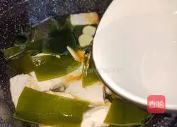 Illustration of how to make kelp stewed tofu 7