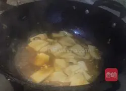 Illustration of how to make king oyster mushrooms and broccoli with abalone sauce 10