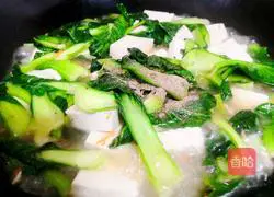 Illustration of how to make braised tofu with small rapeseed 7