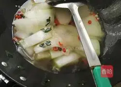Illustration of how to make vegetarian fried winter melon slices 6