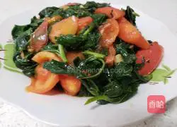 Illustration of how to stir-fry tomatoes with sweet potato leaves 6