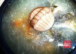 Illustration of how to make papaya fish soup 6