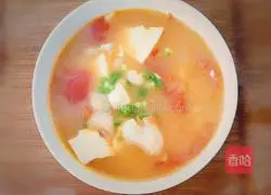 Illustration of how to make tomato, basa, fish and tofu soup 9