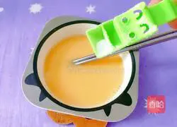 Illustration of how to make sea cucumber, wolfberry and egg custard 4