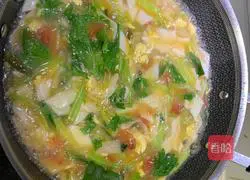Illustration of how to make tomato and egg soup rice 5