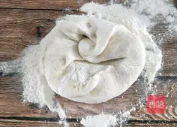 Illustration of how to make flowering steamed buns 11