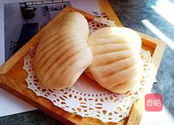 Illustration of how to make shell steamed buns 10