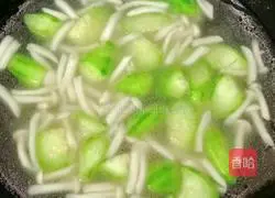 Illustration of how to make luffa, mushroom and egg drop soup 12