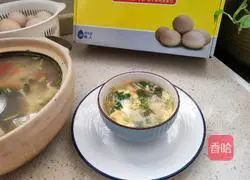 Illustration of how to make tomato and enoki mushroom egg drop soup 8