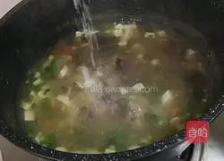 Illustration of how to make tomato and tofu soup 14