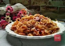 Illustration of how to make spicy fried noodles with ham sausage 12