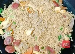 Illustration of how to make fried instant noodles with meatballs and sausages 18