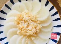 Illustration of how to make steamed radish with scallops 4