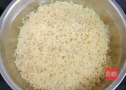 Illustration of how to make fried instant noodles with meatballs and sausages 9