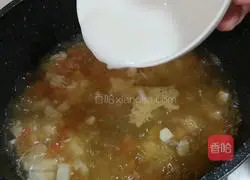 Illustration of how to make tomato tofu soup 10