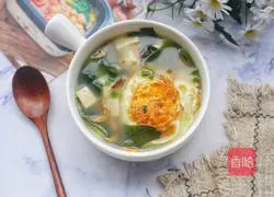 Illustration of how to make wakame, egg and tofu soup 11