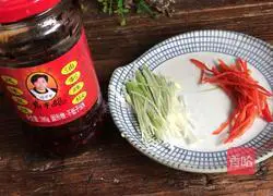 Illustration of how to make steamed white beans with black bean sauce 3