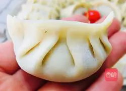 Illustration of how to make watercress and pork dumplings 9