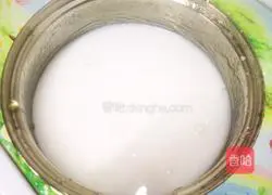 Illustration of how to make coconut mango sago 7