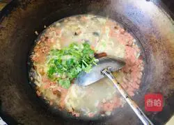 Illustration of how to make preserved egg and tofu soup 9