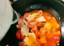 Illustration of how to make tomato, egg and meatball soup 14