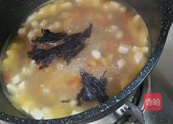 Illustration of how to make tomato and tofu soup 11