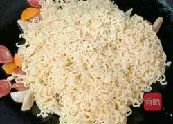 Illustration of how to make fried instant noodles with meatballs and sausages 14