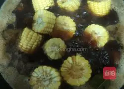 Illustration of how to make braised pork ribs with corn and beans 6