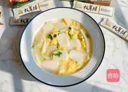 Illustration of how to make rice cake slices with cabbage in clear soup 13