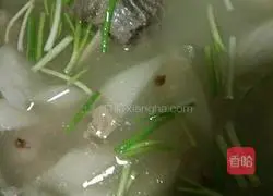 Illustration of how to make braised pork ribs with white radish 7