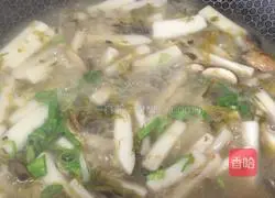 Illustration of how to make pickled vegetable and rice cake soup 10