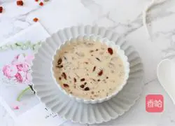 Illustration of how to make peach gum, saponin and rice stewed in milk 12