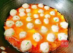 Illustration of how to make tomato, egg and meatball soup 18