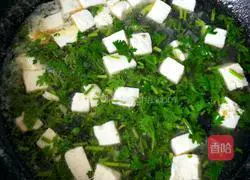 Illustration of how to make preserved egg and tofu soup 13