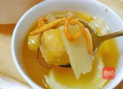 Illustration of how to make bamboo shoots and coconut chicken soup 11