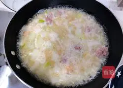 Illustration of how to make salted egg and winter melon meatball soup 8