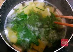 Illustration of how to make asparagus tofu soup 8