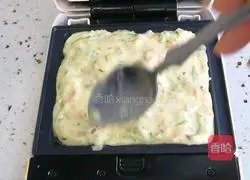 Illustration of how to make cucumber shredded egg pancake 8